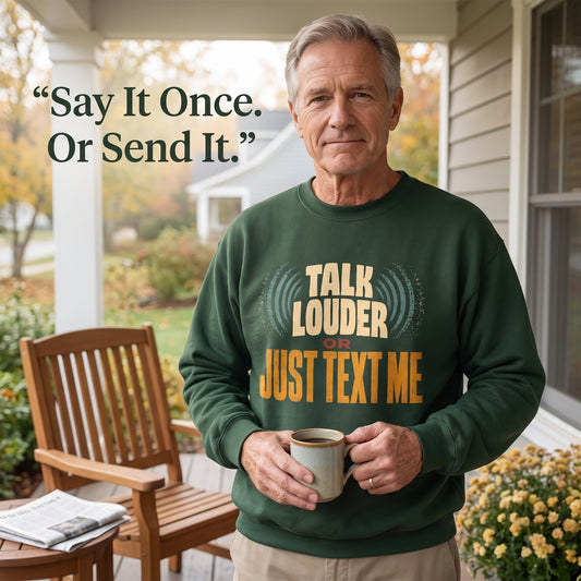 Older man on porch wearing green sweatshirt with printed texting design