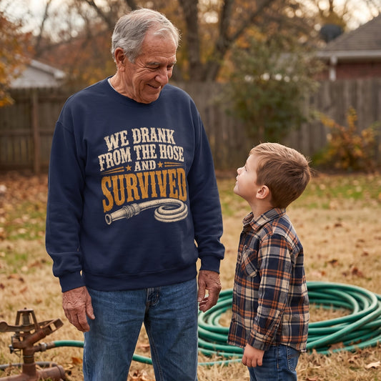 Backyard scene with navy sweatshirt showing printed hose and survived design