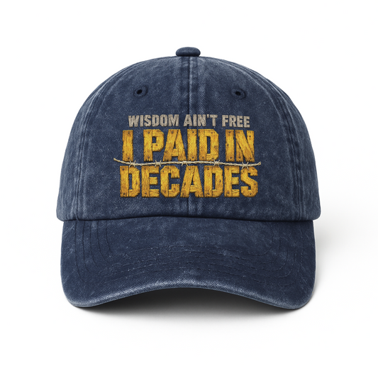 Navy washed cap front with printed Wisdom Ain't Free paid in decades design