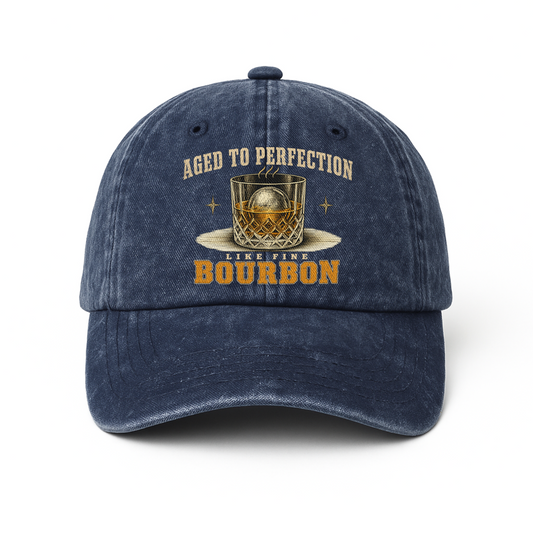 Navy washed cap with Aged To Perfection bourbon glass printed front design