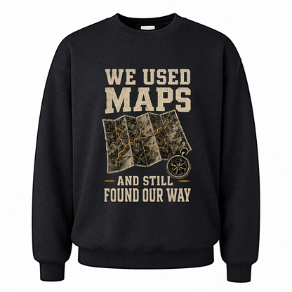 Black vintage sweatshirt with We Used Maps and Still Found Our Way printed front design