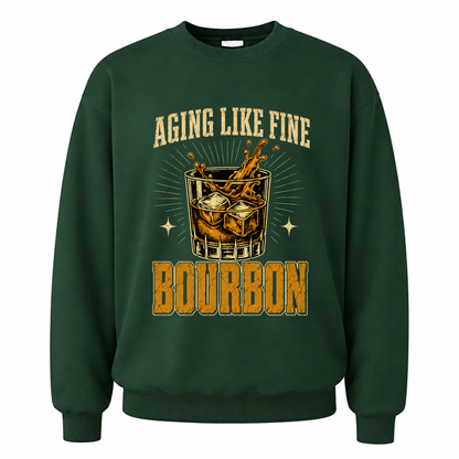 Forest Green vintage sweatshirt with Aging Like Fine Bourbon printed front design