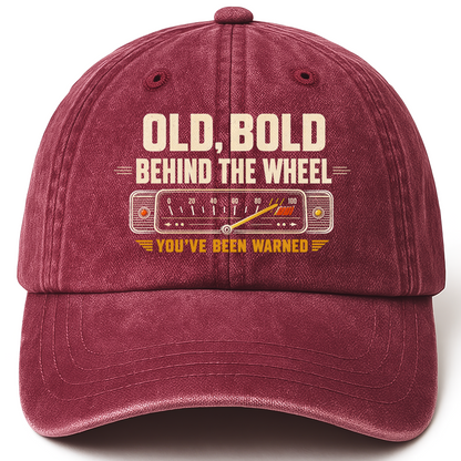 Wine Red vintage washed cap with Old, Bold, Behind The Wheel. You’ve Been Warned printed front design