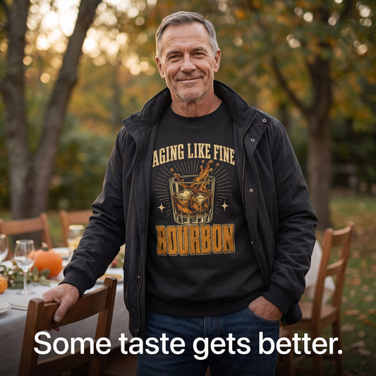 Senior man wearing black sweatshirt by outdoor dining table with pumpkins and glasses