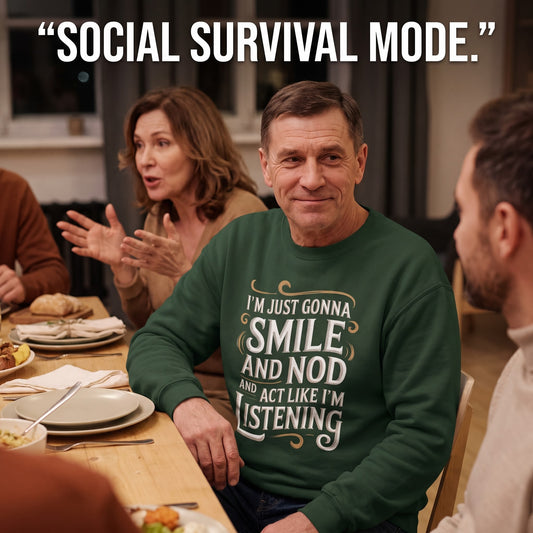 Dinner gathering with green sweatshirt showing printed Smile and Nod design