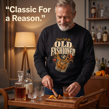 Man in black sweatshirt mixing drinks at bar cart with bottles