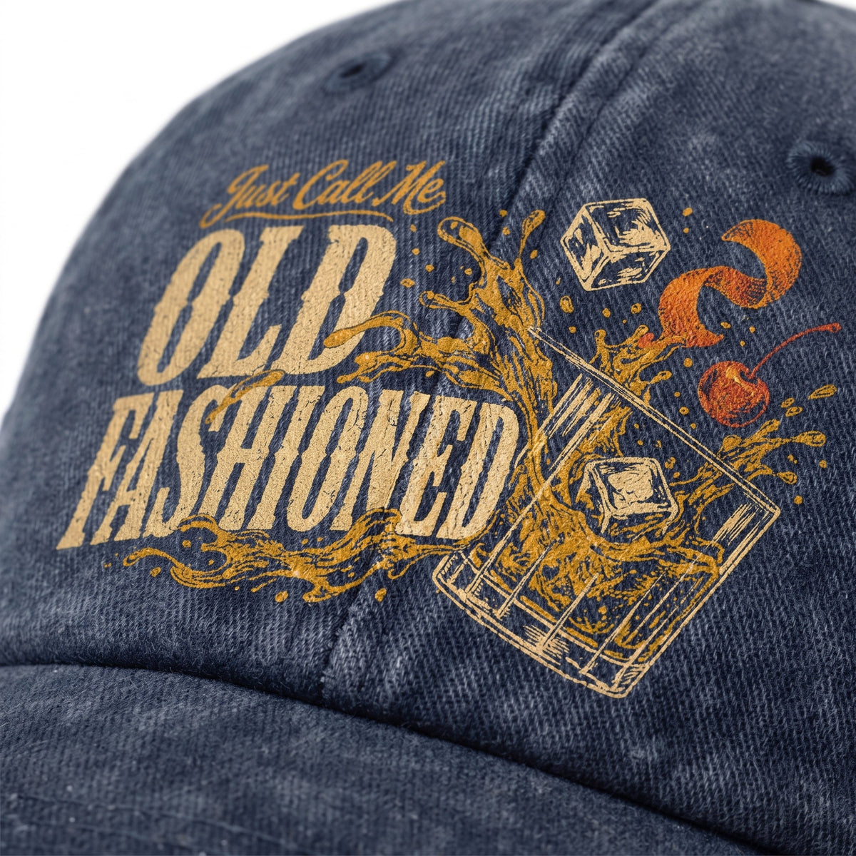 Close-up navy washed cap showing Old Fashioned whiskey glass front print