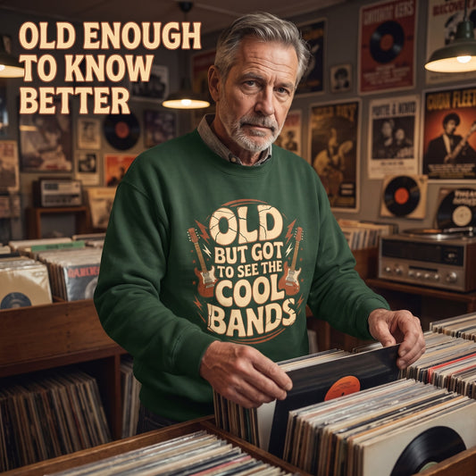 Man in forest green sweatshirt browsing records in music shop