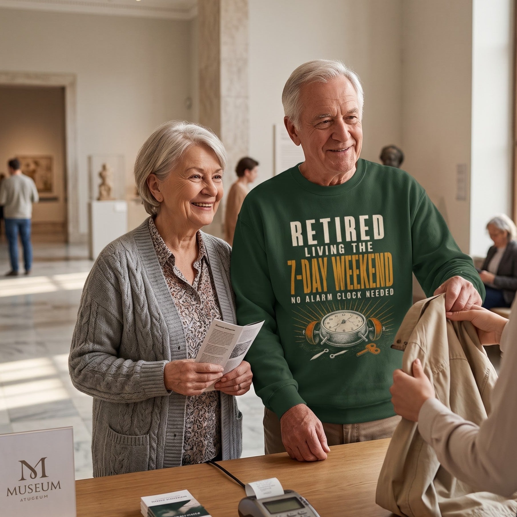 Model wearing forest green sweatshirt with Retired. Living the 7-Day Weekend. No Alarm Clock printed graphic