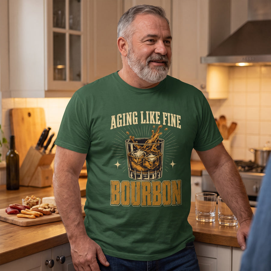 Senior man wearing green Aging Like Fine Bourbon T-shirt in kitchen