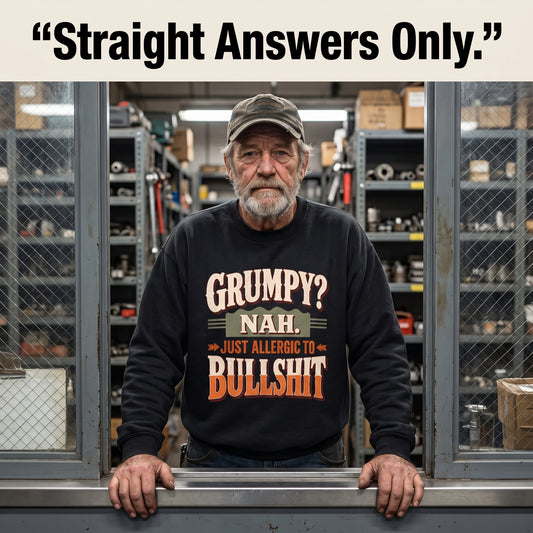 Senior man wearing black Grumpy sweatshirt at parts counter window