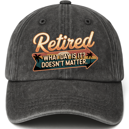 Black vintage washed cap with “Retired. What Day Is It? Doesn’t Matter.” Vintage Sunset Neon Style Cap printed front design