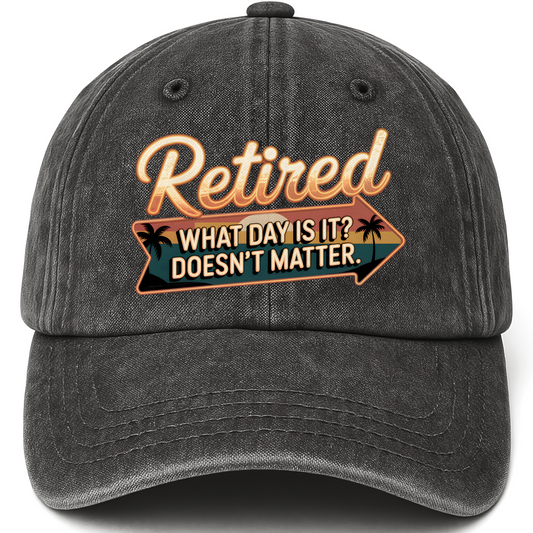 Black vintage washed cap with “Retired. What Day Is It? Doesn’t Matter.” Vintage Sunset Neon Style Cap printed front design