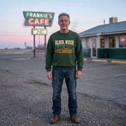 Older. Wiser. Still Dangerous sweatshirt shown in Oldmanism lifestyle product photo
