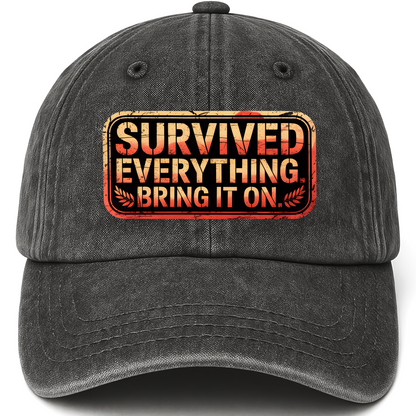 Black vintage washed cap with “Survived Everything. Bring It On.” Rusted West Grit Cap printed front design