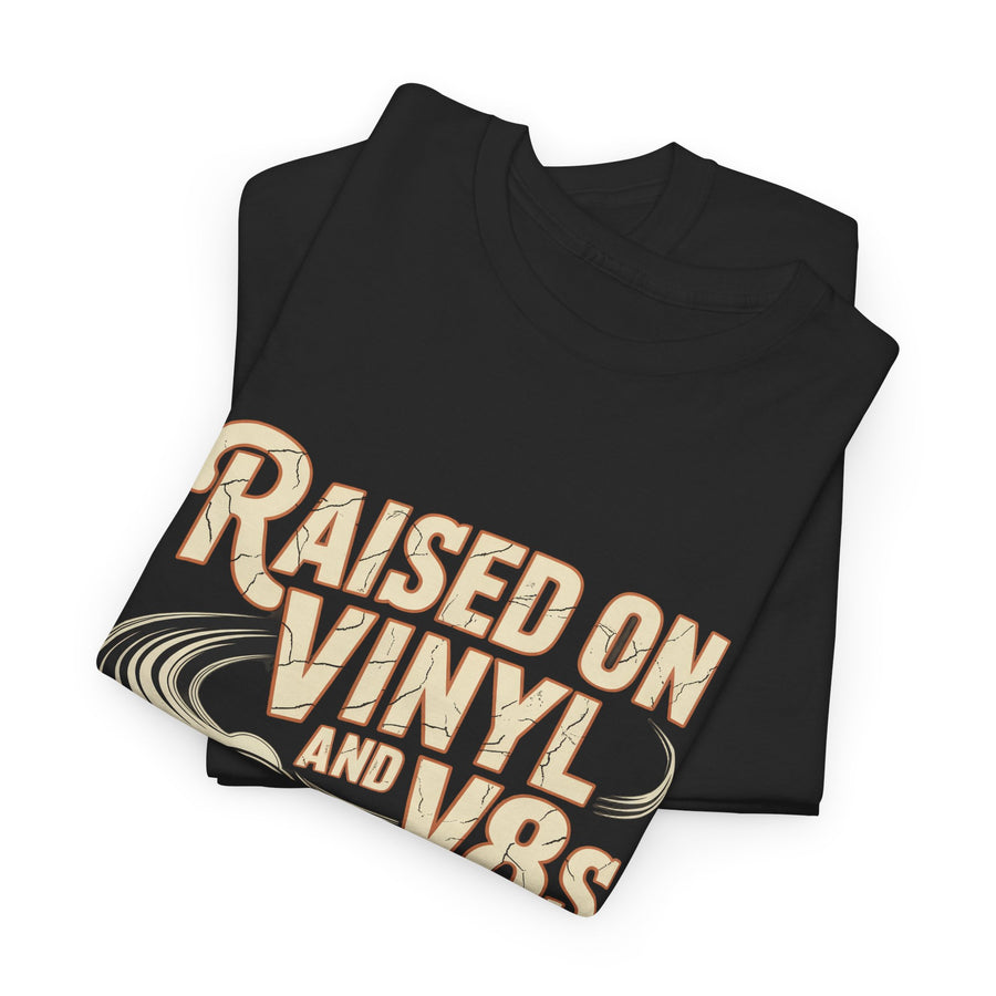 Folded black T-shirt showing Raised on Vinyl and V8s printed design