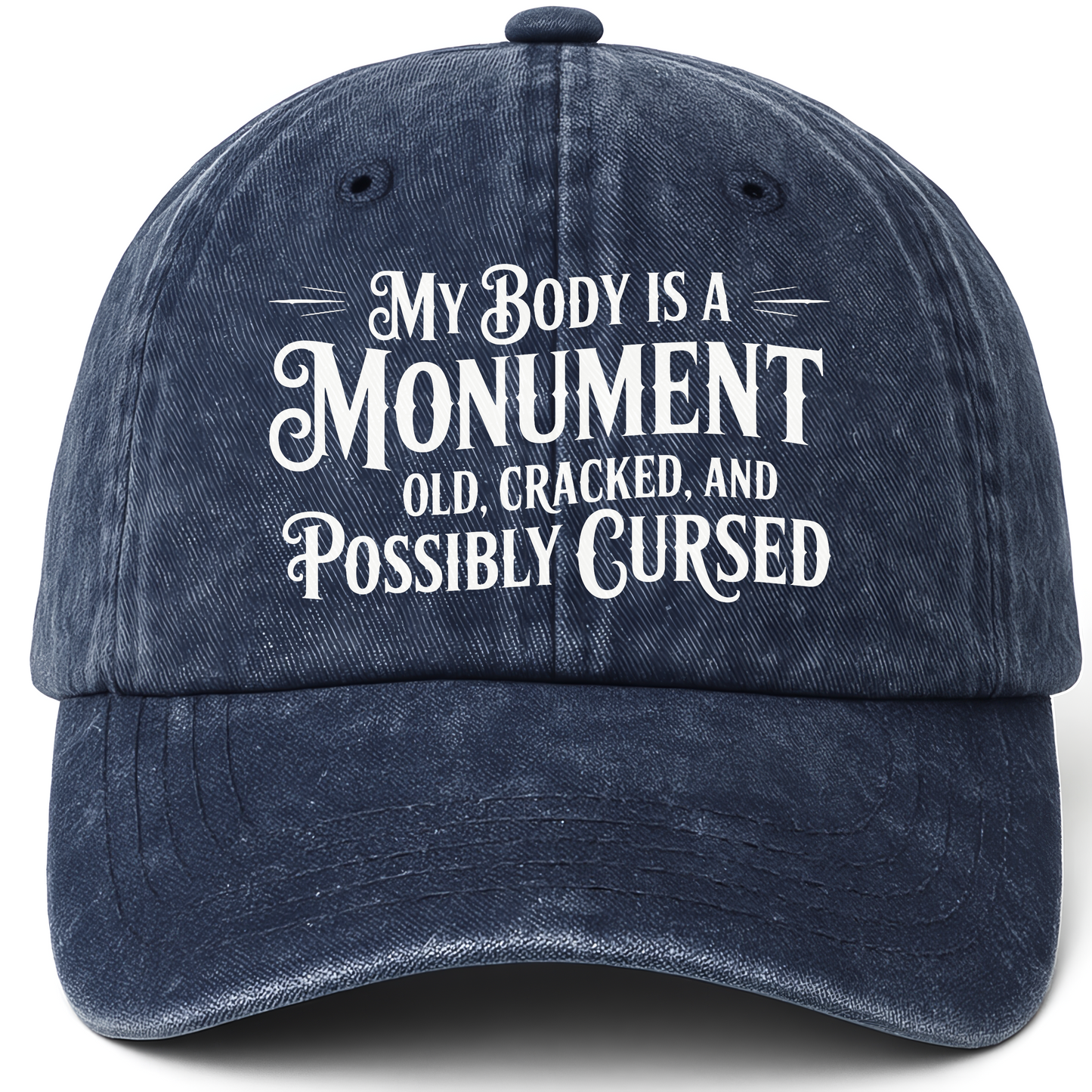 Navy vintage washed cap with “My Body Is a Monument. Old, Cracked, and Possibly Cursed.” Gothic Humor Script Cap printed fron