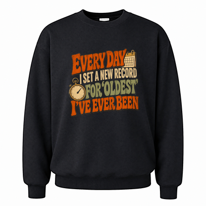 Black vintage sweatshirt with Everyday I Set a New Record for Oldest I've Ever Been printed front design