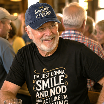 Man wearing navy cap in busy bar while smiling at crowd