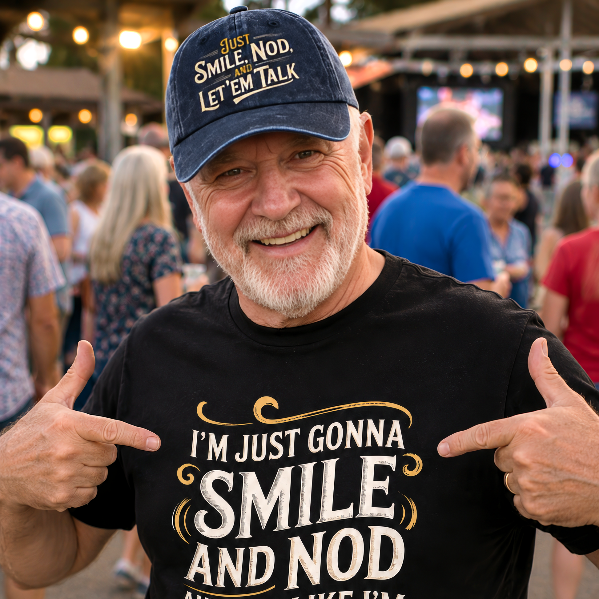 Man wearing navy cap at crowded event pointing to matching T-shirt