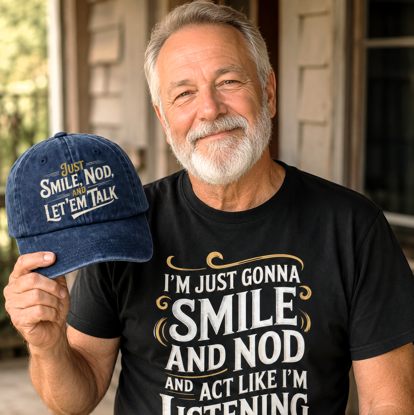 Man holding navy cap while wearing matching black T-shirt on porch