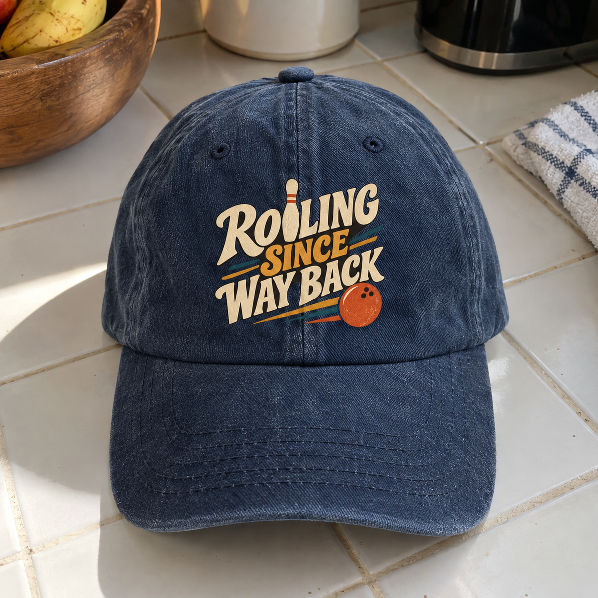 Blue vintage washed cap with printed Rolling Since Way Back slogan front angle