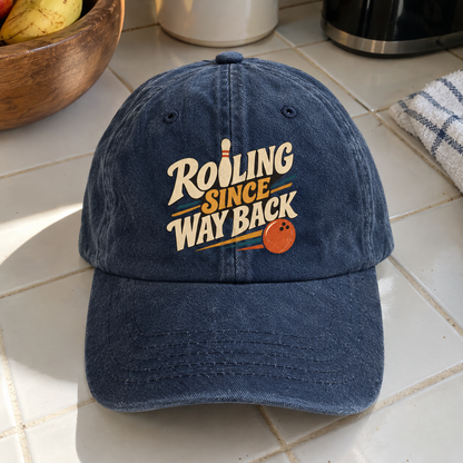 Blue vintage washed cap with printed Rolling Since Way Back slogan front angle
