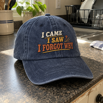 Angled view of navy vintage washed cap printed with I Came I Saw I Forgot Why