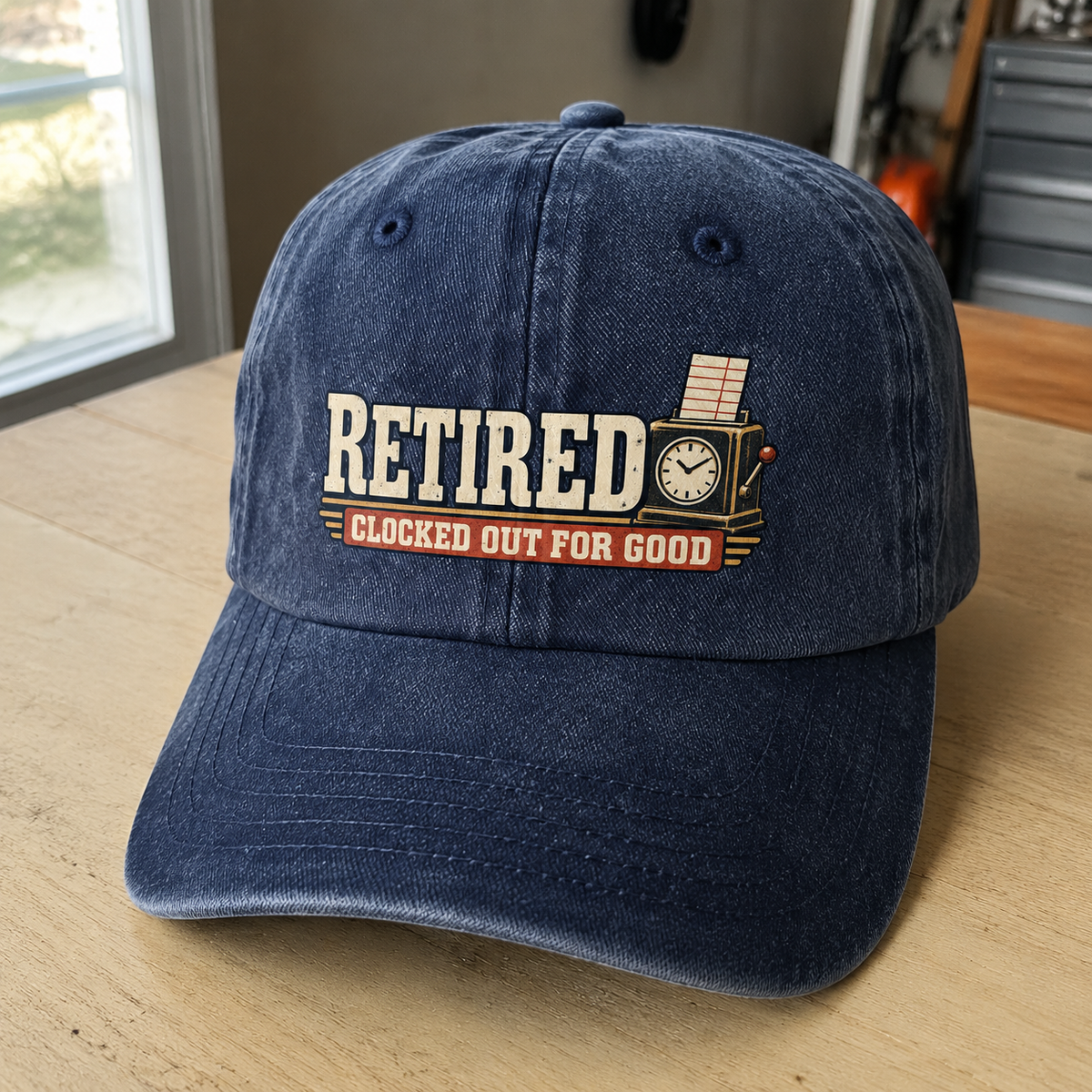 Navy vintage washed cap with printed Clocked Out For Good slogan, front angle view