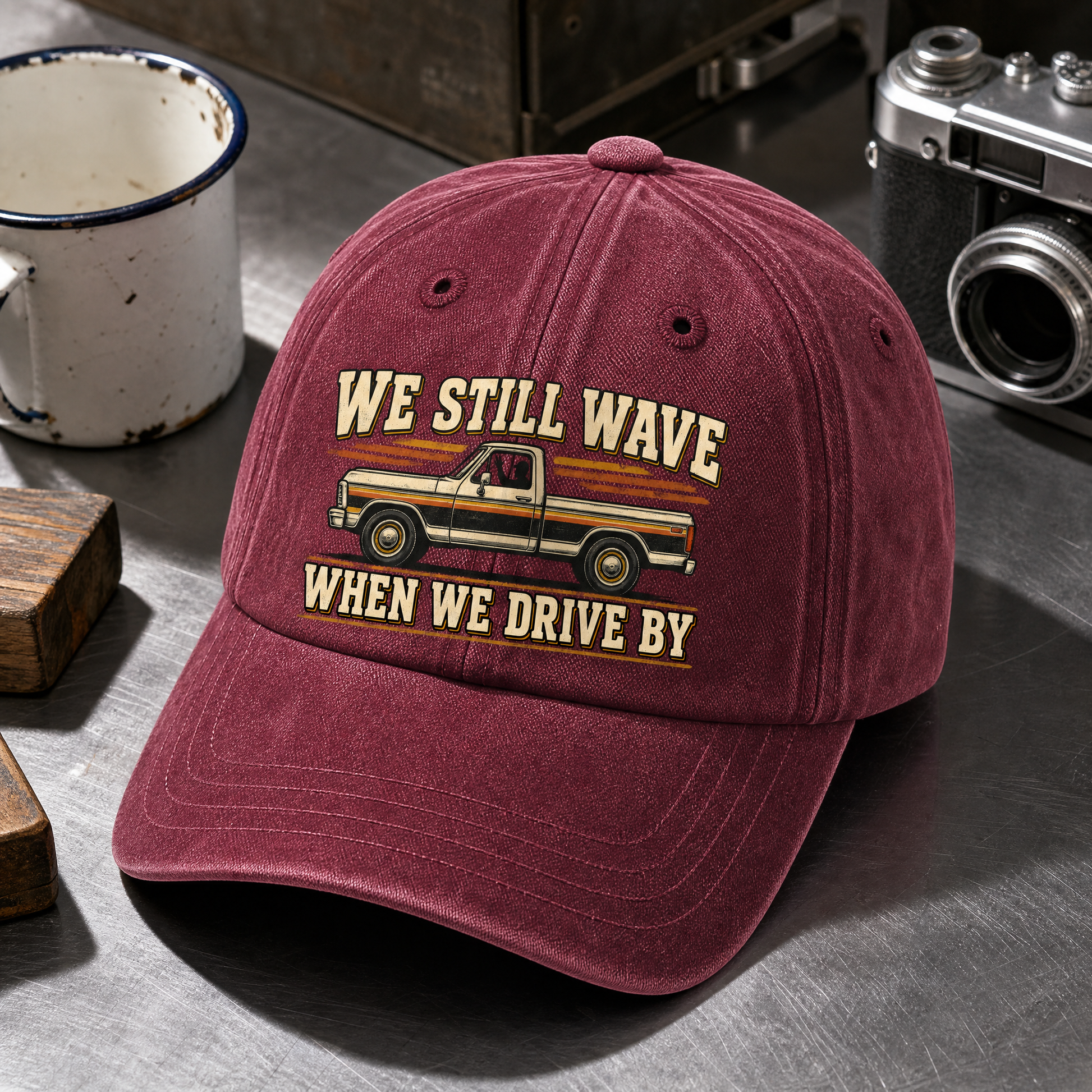 Close-up angle views of vintage washed cap with We Still Wave When We Drive By printed design