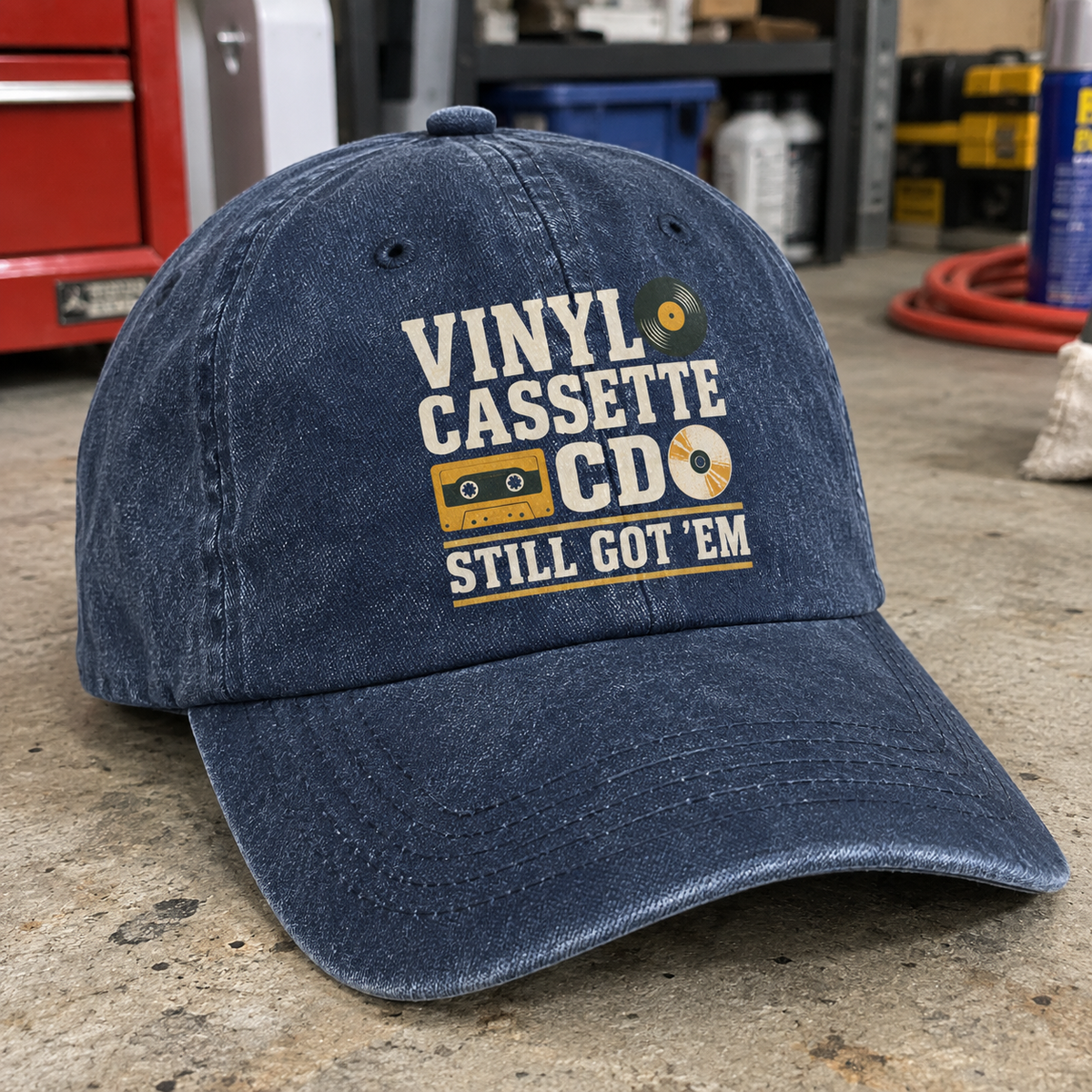 Blue vintage washed cap with printed Vinyl Cassette CD Still Got ’Em design front angle