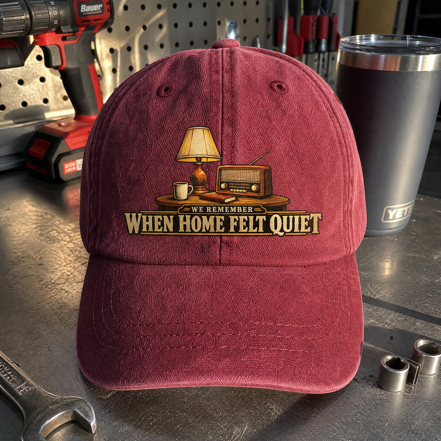Close-up angle views of vintage washed cap with We Remember When Home Felt Quiet printed design