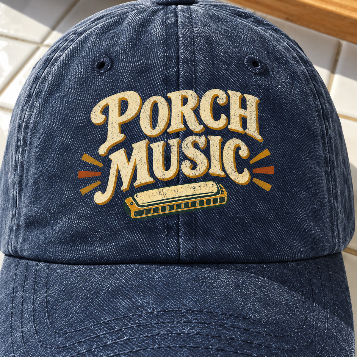 Navy vintage washed cap with printed Porch Music design and harmonica, front angle