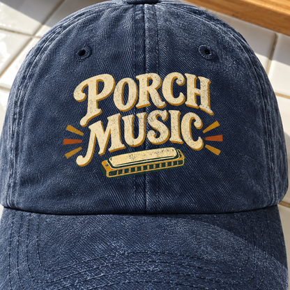 Navy vintage washed cap with printed Porch Music design and harmonica, front angle