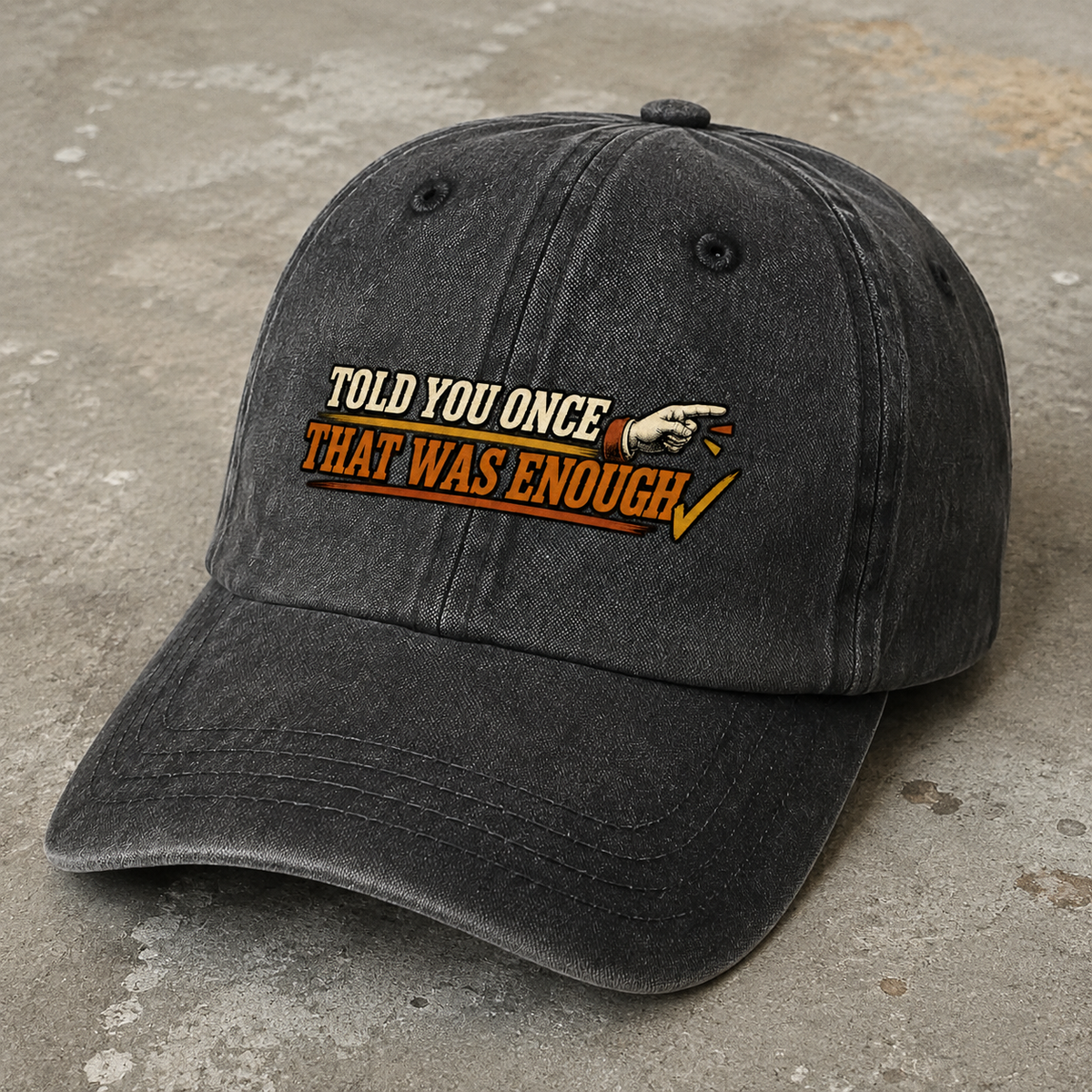 Black vintage washed cap with printed Told You Once That Was Enough slogan angled view