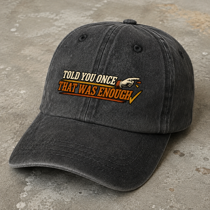 Black vintage washed cap with printed Told You Once That Was Enough slogan angled view