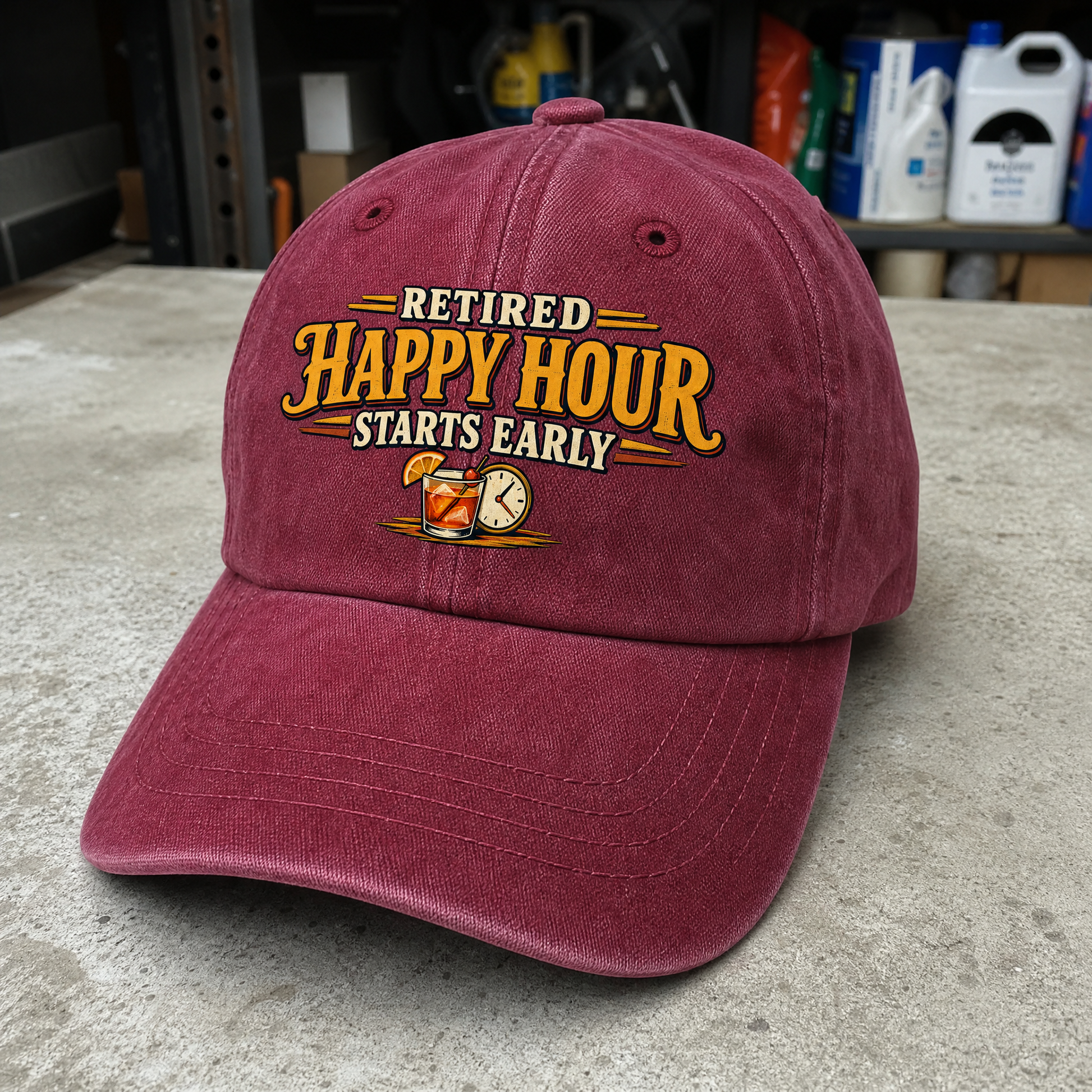 Burgundy vintage washed cap printed with “Retired Happy Hour Starts Early,” front angle
