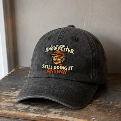 Black vintage washed cap with printed Old Enough To Know Better Still Doing It Anyway