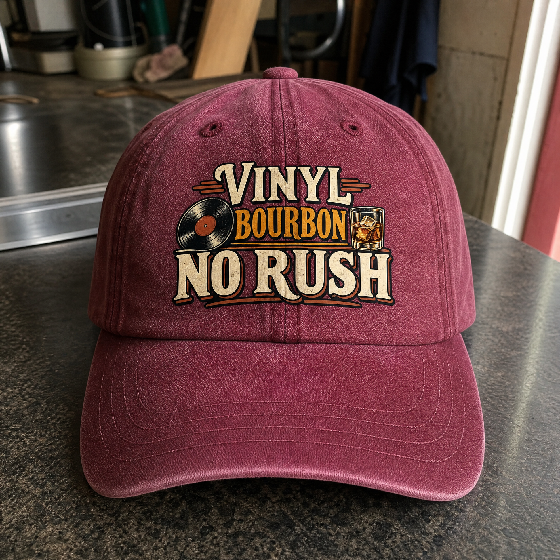 Burgundy vintage washed cap with printed Vinyl Bourbon No Rush slogan front angle