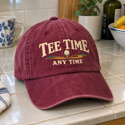Burgundy vintage washed cap with printed Tee Time Anytime golf design, front angle