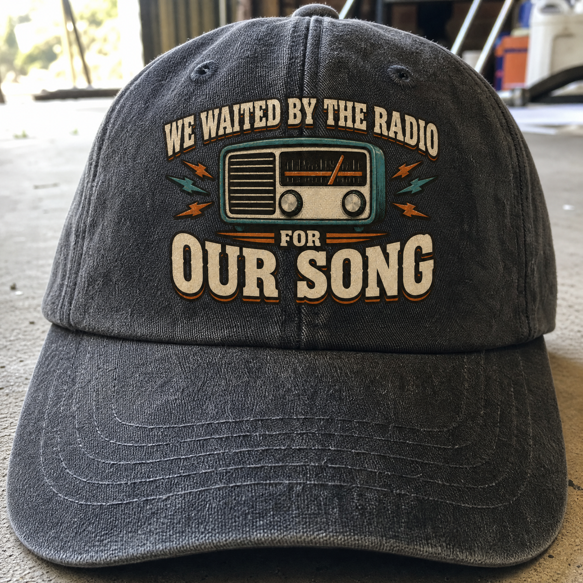 Black vintage washed cap with printed We Waited By The Radio For Our Song design