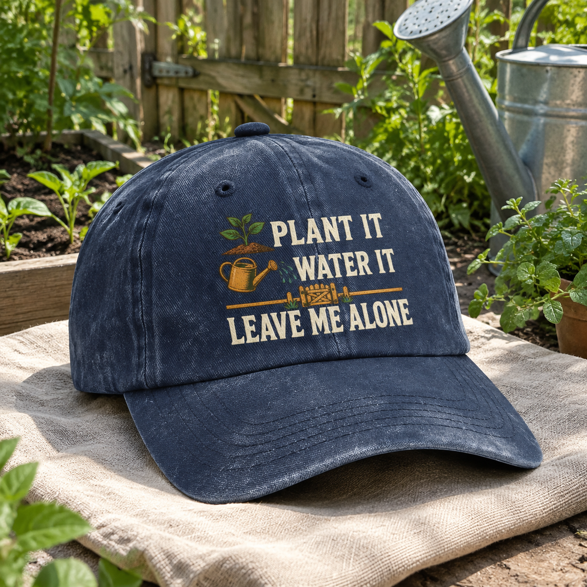 Navy vintage washed cap with printed Plant It Water It Leave Me Alone slogan, angled