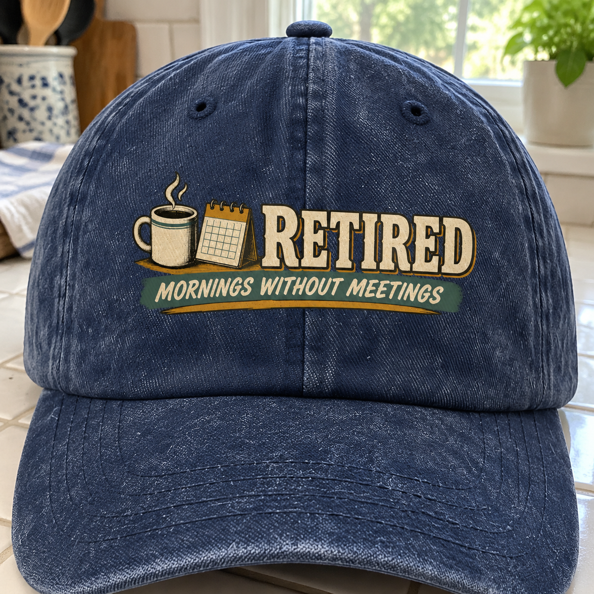 Navy vintage washed cap with printed Mornings Without Meetings slogan, front angle view