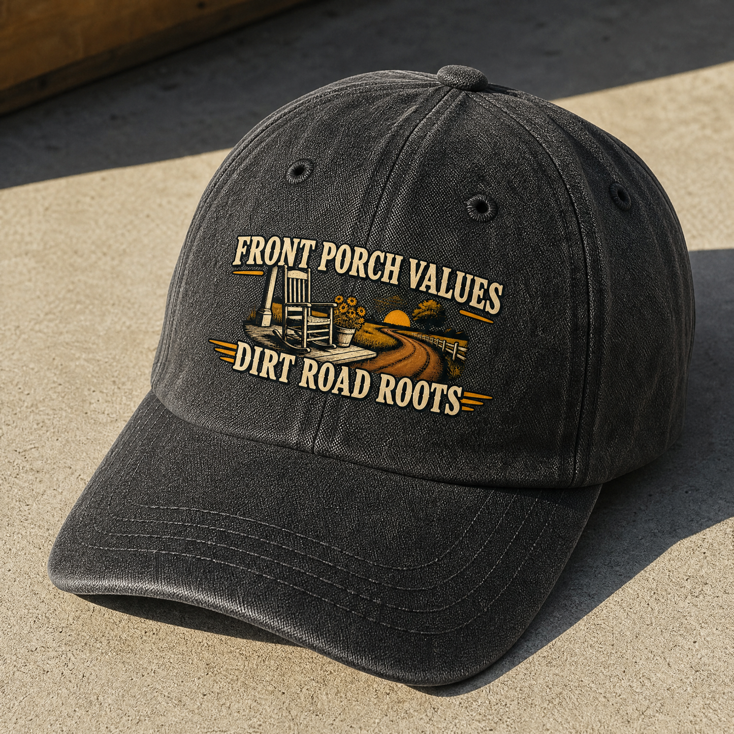 Black vintage washed cap with printed Front Porch Values Dirt Road Roots slogan, angled view