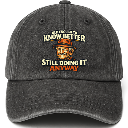 Black vintage washed cap with Old Enough To Know Better Still Doing It Anyway printed front design