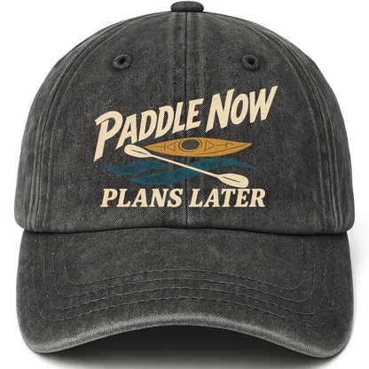 Black vintage washed cap with Paddle Now Plans Later printed front design