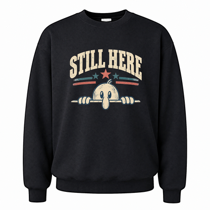 Black vintage sweatshirt with Still Here printed front design