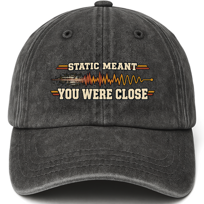 Black vintage washed cap with Static Meant You Were Close printed front design