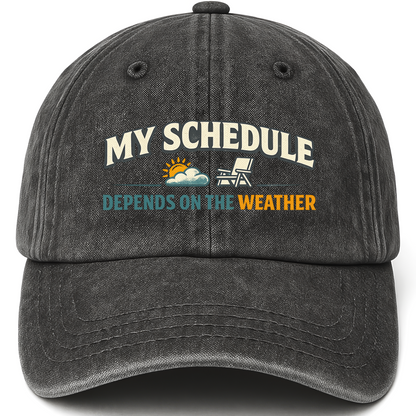 Black vintage washed cap with My Schedule Depends On The Weather printed front design