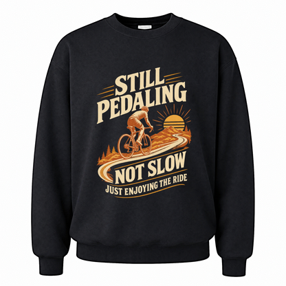 Black vintage sweatshirt with Still Pedaling Not Slow Just Enjoying The Ride printed front design